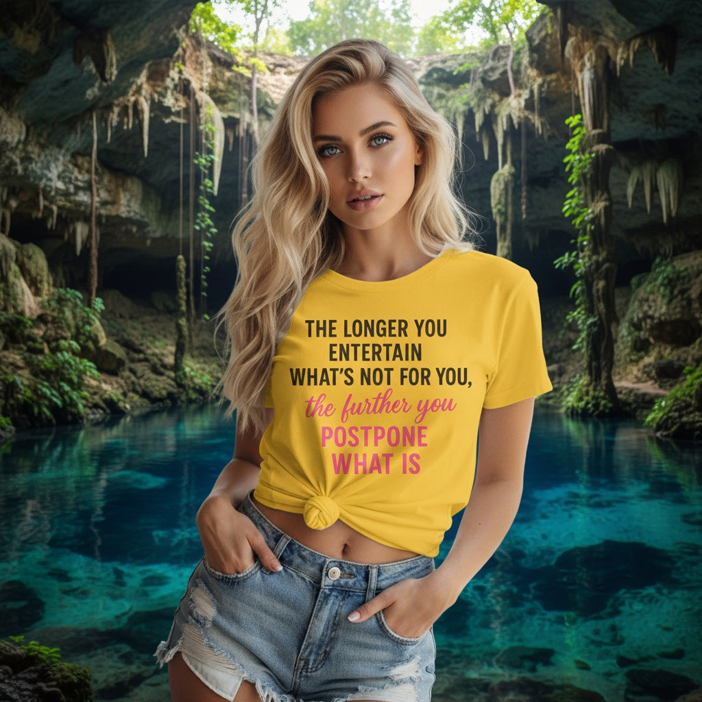 Woman wearing a yellow funny empowerment t-shirt that says the longer you entertain what’s not for you the further you postpone what is cenote mexico