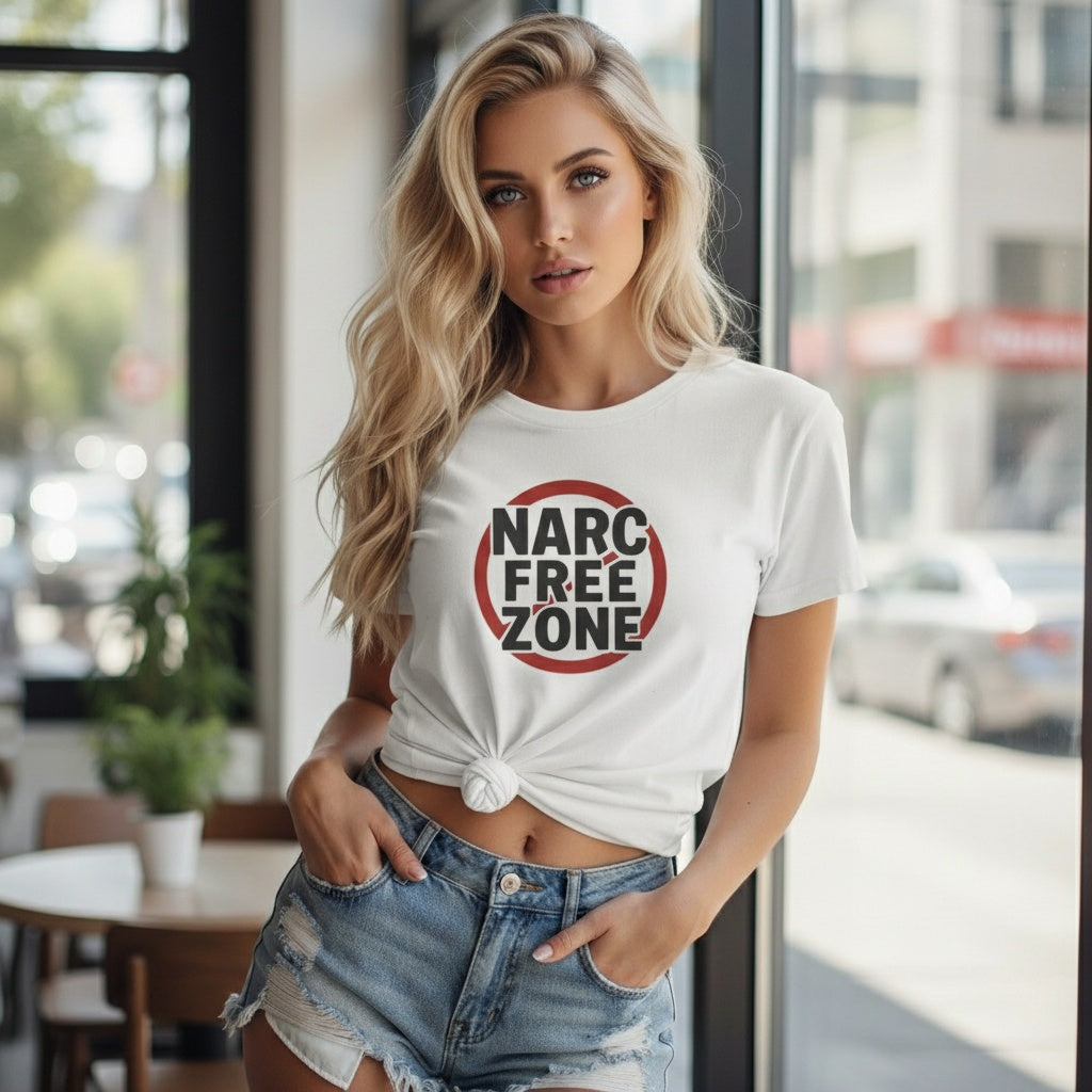 Confident woman wearing “Narc Free Zone” empowerment t-shirt for emotional healing.