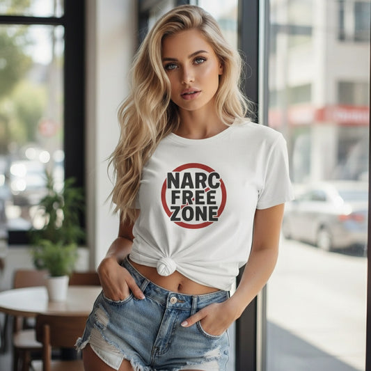 Confident woman wearing “Narc Free Zone” empowerment t-shirt for emotional healing.